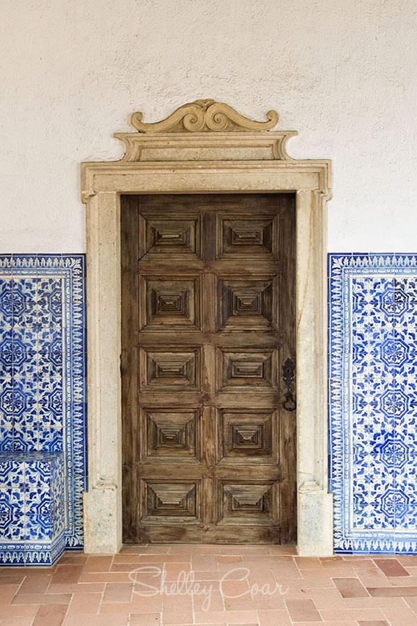 Doors in Convent of Christ Tomar by Shelley Coar https://wanderlustbound.com/doors-of-the-world/